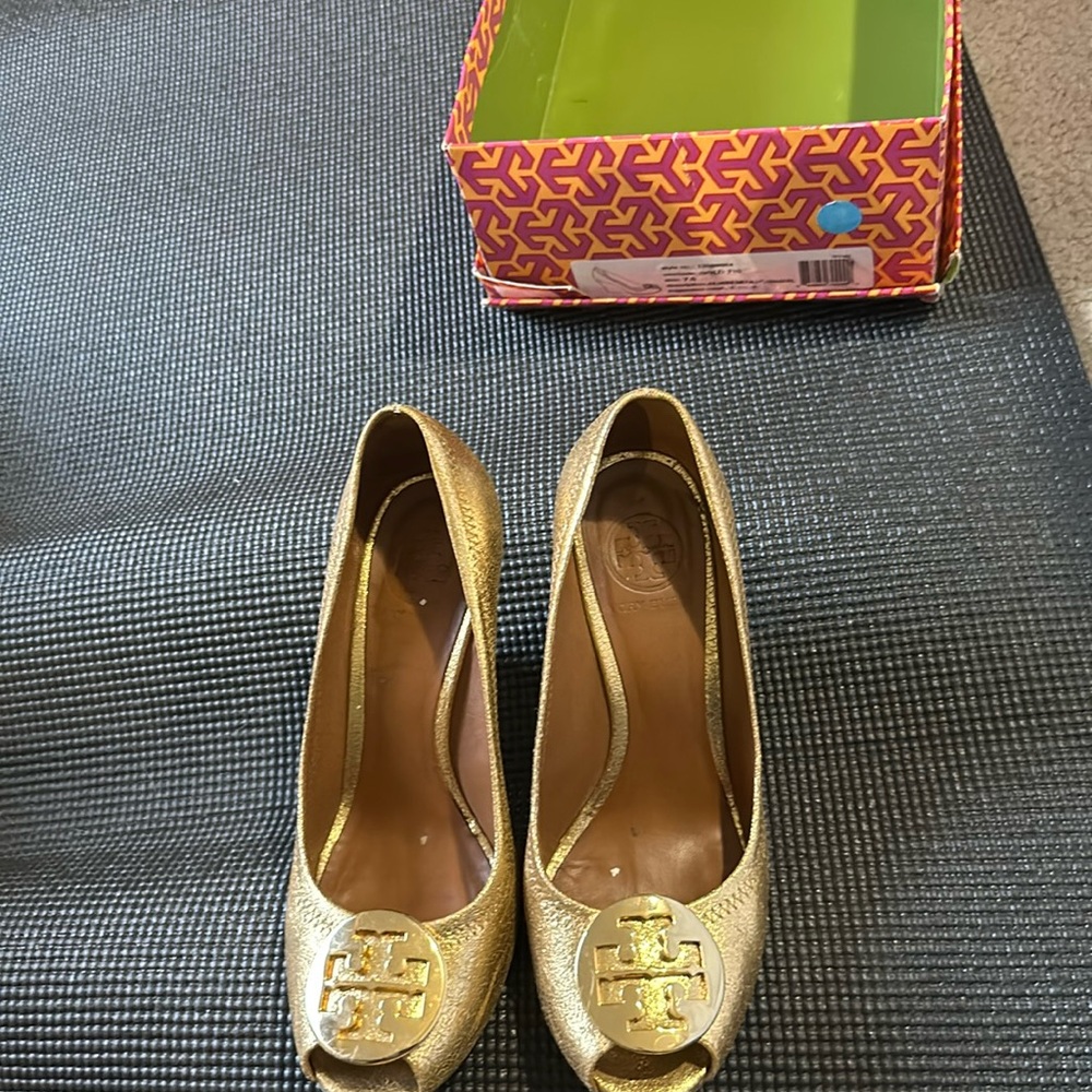 Gently used metallic gold Tory Burch wedges